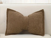 Brown bow shaped  cushion (insert included) 30 x 50 cm
